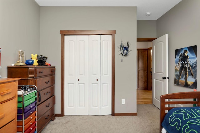 2349 175th Ln NE, Ham Lake, MN 55304 - bedroom featuring light carpet, a closet, and baseboards