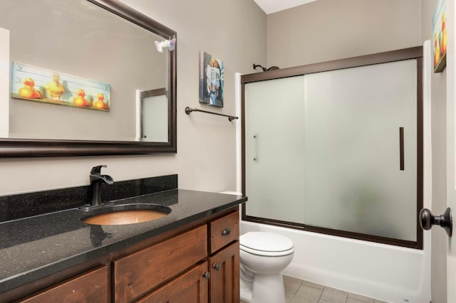 2349 175th Ln NE, Ham Lake, MN 55304 - full bath featuring vanity, toilet, and bath / shower combo with glass door
