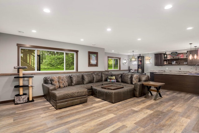 2349 175th Ln NE, Ham Lake, MN 55304 - living room featuring light wood finished floors, recessed lighting, and wet bar