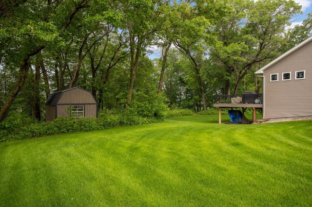 2349 175th Ln NE, Ham Lake, MN 55304 - view of green lawn featuring a deck