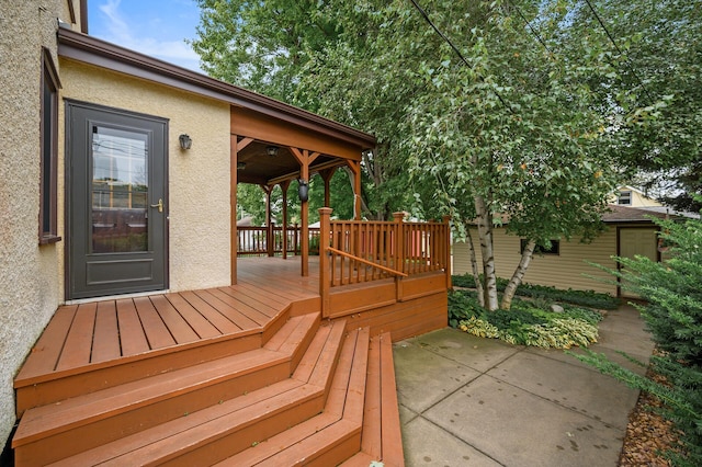1928 Cleveland St NE, Minneapolis, MN 55418 - wooden terrace featuring a patio area