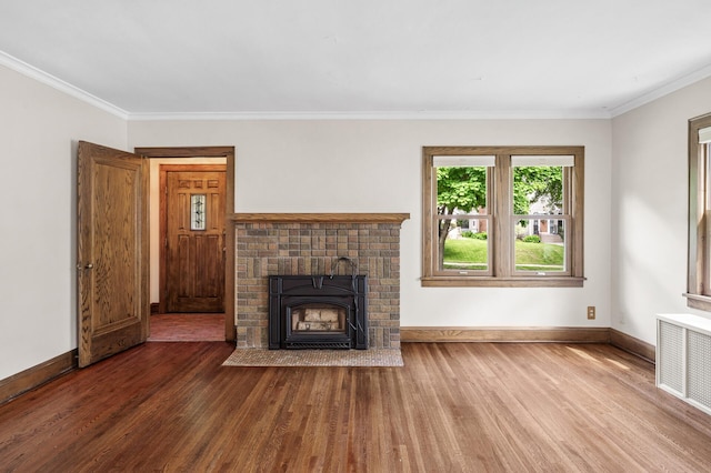 1928 Cleveland St NE, Minneapolis, MN 55418 - unfurnished living room featuring wood finished floors, baseboards, crown molding, and a fireplace