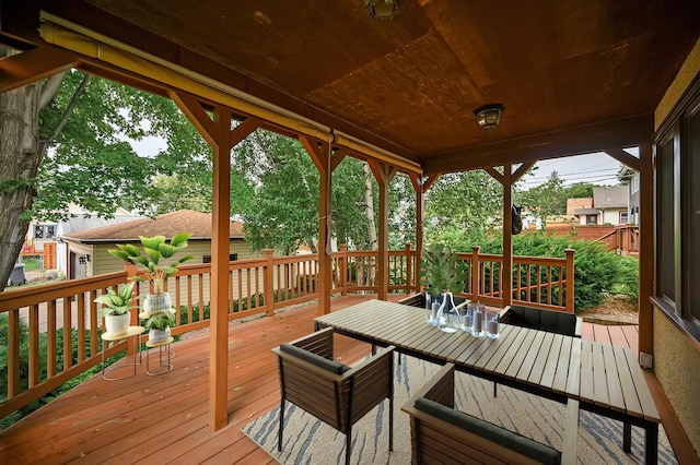 1928 Cleveland St NE, Minneapolis, MN 55418 - wooden deck with outdoor dining area