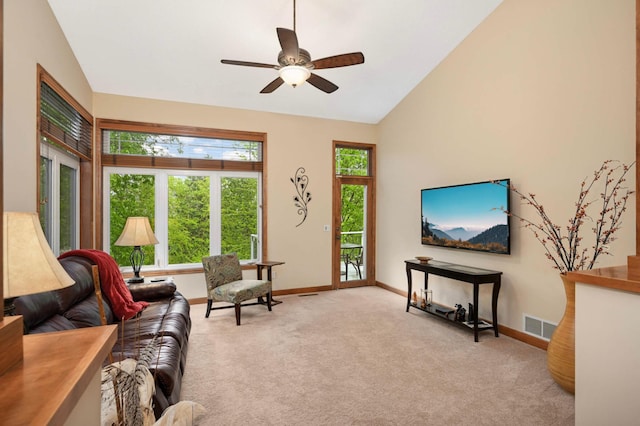 14550 Hunters Ln, Savage, MN 55378 - carpeted living area featuring baseboards, a ceiling fan, and high vaulted ceiling
