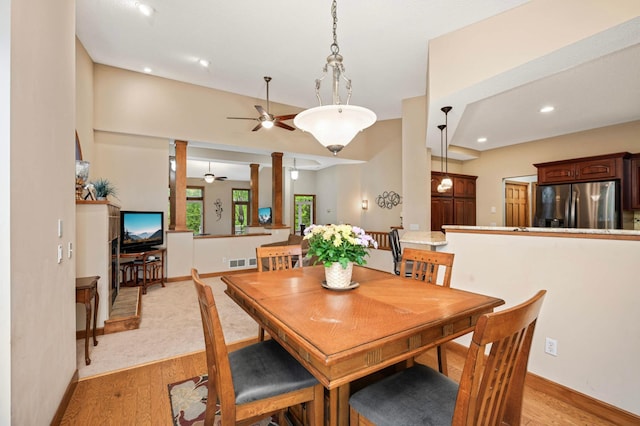 14550 Hunters Ln, Savage, MN 55378 - dining room with decorative columns, light wood finished floors, a ceiling fan, baseboards, and recessed lighting