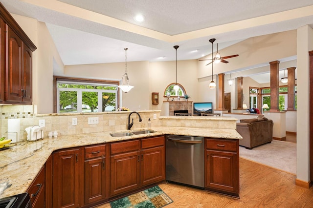 14550 Hunters Ln, Savage, MN 55378 - kitchen with dishwasher, a sink, vaulted ceiling, light stone counters, and decorative backsplash