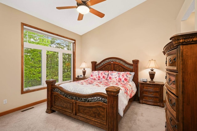 14550 Hunters Ln, Savage, MN 55378 - bedroom with light colored carpet, lofted ceiling, baseboards, and a ceiling fan