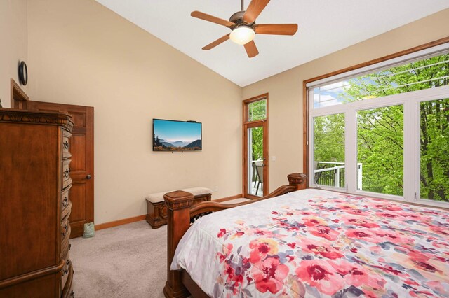 14550 Hunters Ln, Savage, MN 55378 - bedroom with light carpet, baseboards, access to outside, a ceiling fan, and high vaulted ceiling