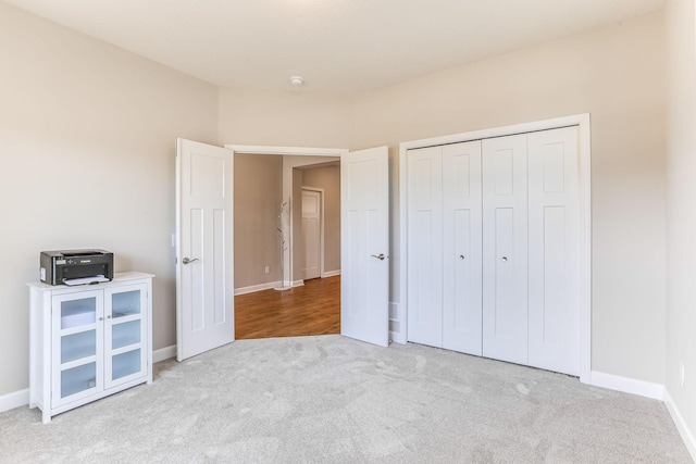 19171 Cottage Rd, Farmington, MN 55024 - unfurnished bedroom featuring carpet floors, baseboards, and a closet