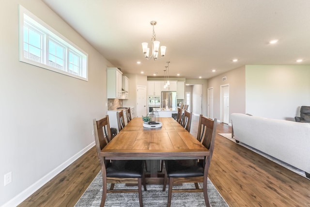 19171 Cottage Rd, Farmington, MN 55024 - dining room with a chandelier, dark wood-style floors, baseboards, and recessed lighting