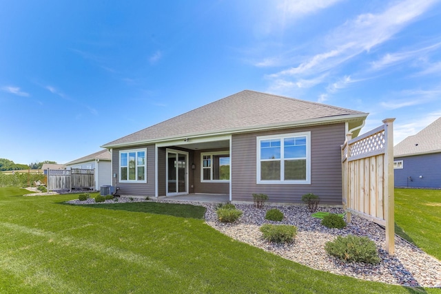 19171 Cottage Rd, Farmington, MN 55024 - back of house featuring central air condition unit, a patio area, and a shingled roof