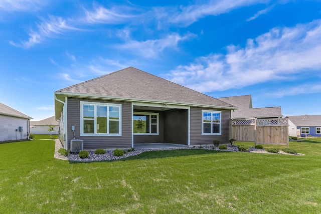 19171 Cottage Rd, Farmington, MN 55024 - back of house with a patio area, cooling unit, and a shingled roof