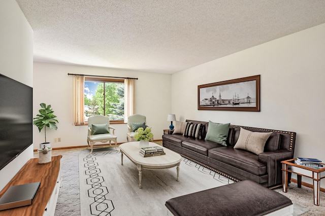 1871 Livingston Ave Unit C, West Saint Paul, MN 55118 - living area featuring a textured ceiling and baseboards