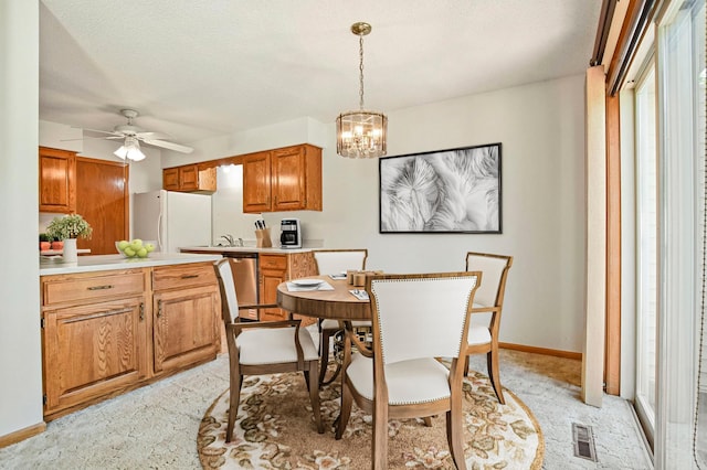 1871 Livingston Ave Unit C, West Saint Paul, MN 55118 - dining area with ceiling fan, a chandelier, and baseboards