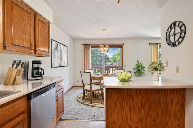 1871 Livingston Ave Unit C, West Saint Paul, MN 55118 - kitchen featuring dishwasher, brown cabinetry, a textured ceiling, a chandelier, and light countertops