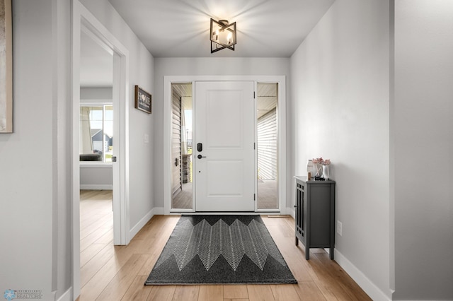 4533 38 1/2 Ave N, Reiles Acres, ND 58102 - foyer with light wood-style flooring and baseboards