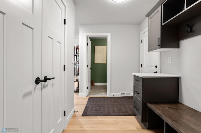 4533 38 1/2 Ave N, Reiles Acres, ND 58102 - mudroom featuring light wood-style flooring and baseboards