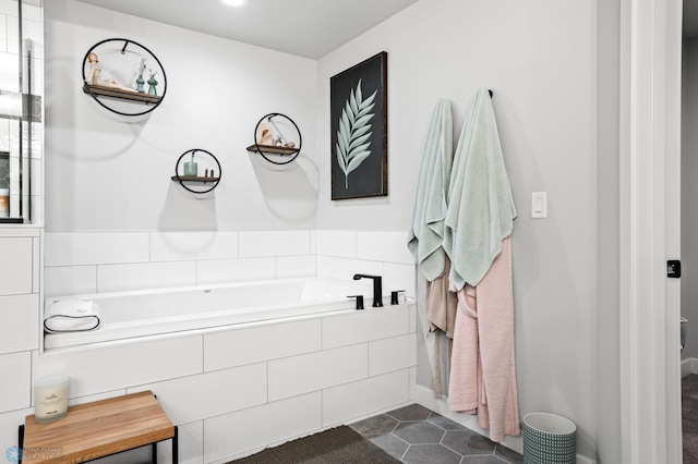 4533 38 1/2 Ave N, Reiles Acres, ND 58102 - full bathroom with a garden tub and tile patterned floors