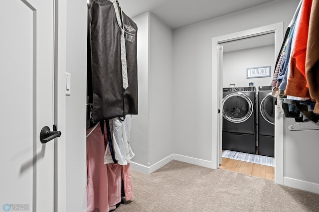 4533 38 1/2 Ave N, Reiles Acres, ND 58102 - washroom with washer and clothes dryer, carpet, and baseboards