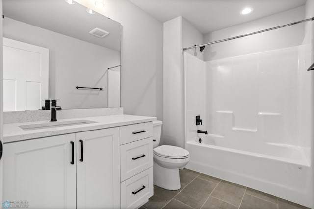 4533 38 1/2 Ave N, Reiles Acres, ND 58102 - full bathroom with vanity, toilet, tile patterned flooring, shower / bath combination, and recessed lighting