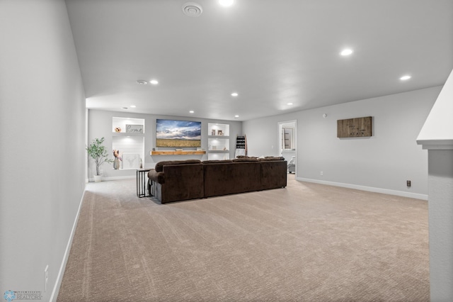 4533 38 1/2 Ave N, Reiles Acres, ND 58102 - living area featuring light colored carpet, baseboards, recessed lighting, and built in features