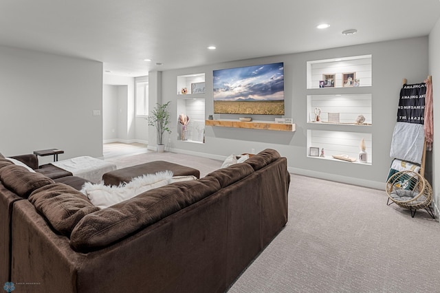 4533 38 1/2 Ave N, Reiles Acres, ND 58102 - living room featuring built in shelves, baseboards, carpet, and recessed lighting