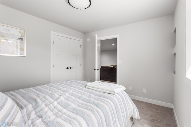 4533 38 1/2 Ave N, Reiles Acres, ND 58102 - bedroom with carpet floors, baseboards, and a closet