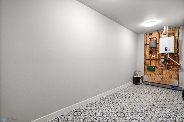 4533 38 1/2 Ave N, Reiles Acres, ND 58102 - unfurnished room featuring water heater and baseboards