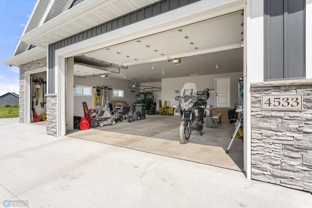 4533 38 1/2 Ave N, Reiles Acres, ND 58102 - garage with a garage door opener and driveway