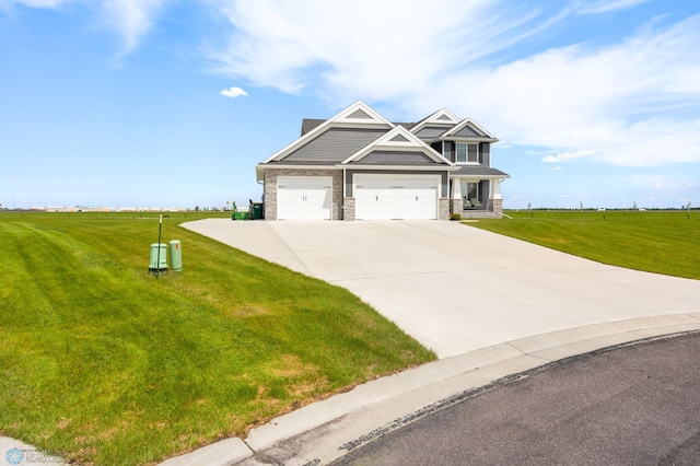 4533 38 1/2 Ave N, Reiles Acres, ND 58102 - craftsman inspired home featuring concrete driveway, a front yard, and a garage