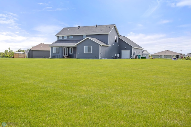 4533 38 1/2 Ave N, Reiles Acres, ND 58102 - back of house with a yard