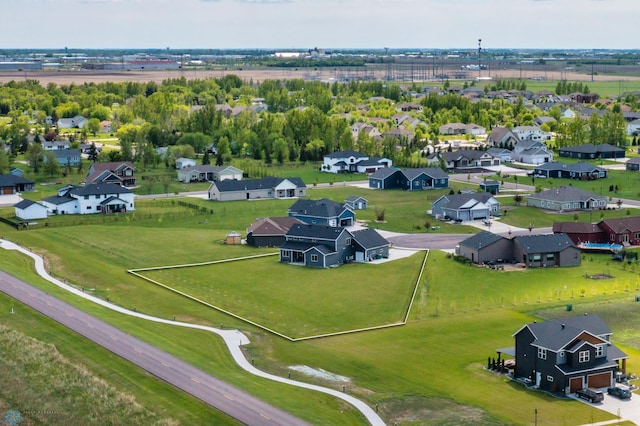 4533 38 1/2 Ave N, Reiles Acres, ND 58102 - aerial perspective of suburban area