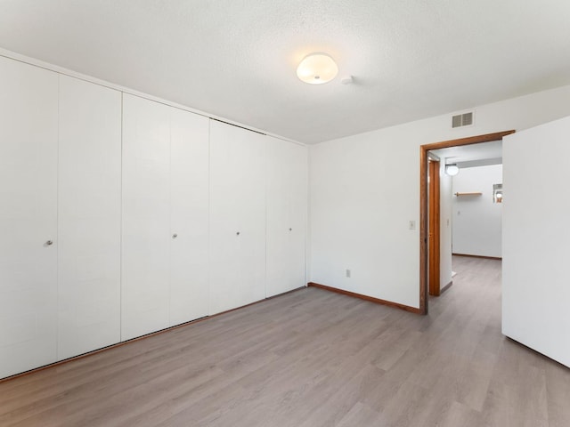 26 Arthur Ave SE Unit 304, Minneapolis, MN 55414 - empty room with light wood-style floors and baseboards
