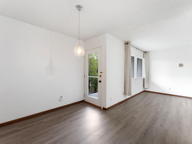 26 Arthur Ave SE Unit 304, Minneapolis, MN 55414 - unfurnished room featuring wood finished floors and baseboards