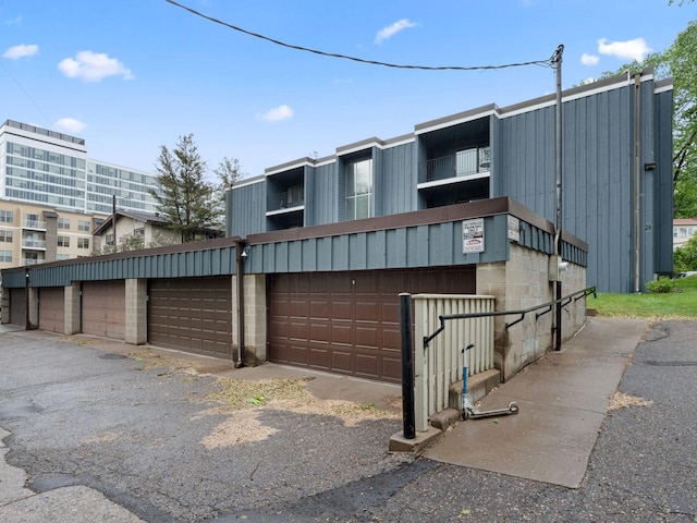 26 Arthur Ave SE Unit 304, Minneapolis, MN 55414 - view of building exterior with community garages