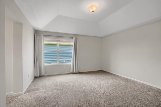 1721 Pebblestone Rd, Carver, MN 55315 - empty room featuring carpet floors, a tray ceiling, and baseboards