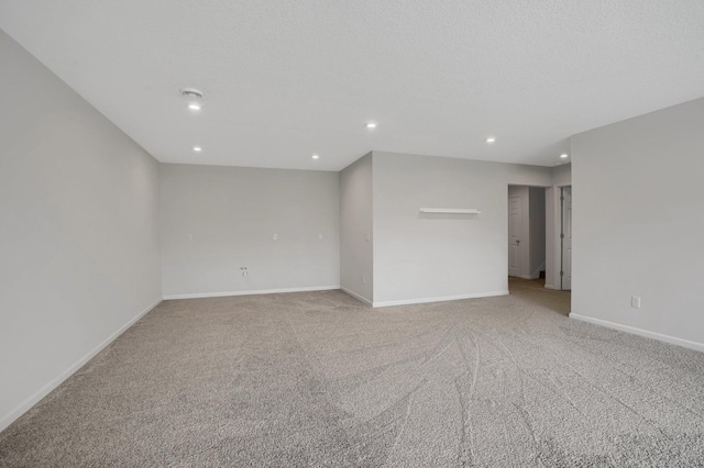 1721 Pebblestone Rd, Carver, MN 55315 - unfurnished room with light carpet, baseboards, and recessed lighting