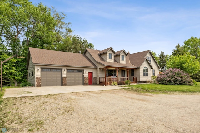 20482 28th Ave N, Cromwell Twp, MN 56549 - view of front of home with a porch, an attached garage, concrete driveway, a front lawn, and roof with shingles