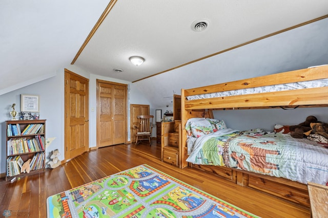 20482 28th Ave N, Cromwell Twp, MN 56549 - bedroom featuring hardwood / wood-style floors and lofted ceiling