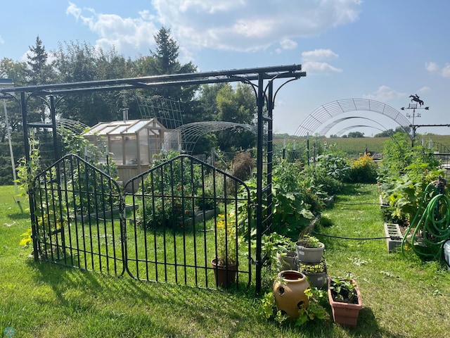 20482 28th Ave N, Cromwell Twp, MN 56549 - view of grassy yard with an exterior structure and an outdoor structure