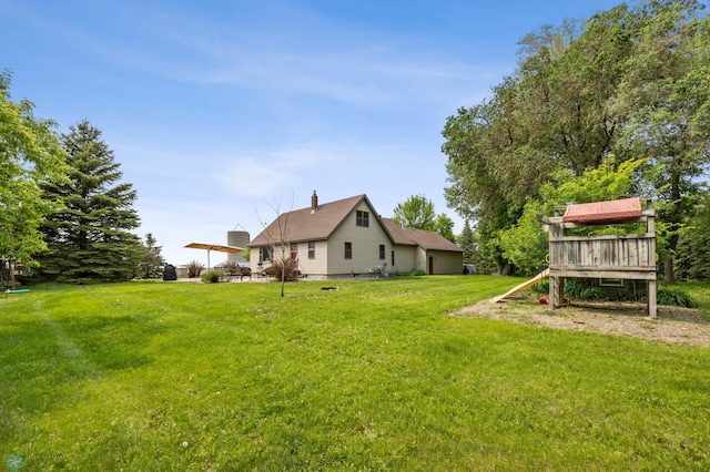 20482 28th Ave N, Cromwell Twp, MN 56549 - view of grassy yard featuring a playground