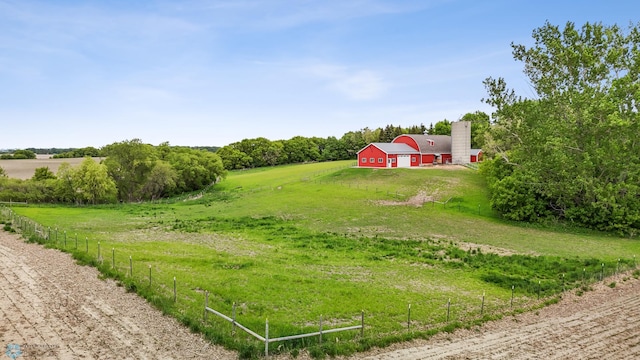 20482 28th Ave N, Cromwell Twp, MN 56549 - view of yard with driveway, a view of countryside, and an outdoor structure