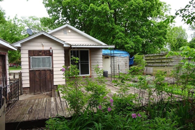 1305 La Crescent St, Campbell Twp, WI 54603 - rear view of house featuring a deck and central air condition unit