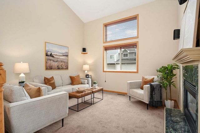 547 Woodduck Dr Unit G, Woodbury, MN 55125 - living room with high vaulted ceiling, a premium fireplace, carpet floors, and baseboards