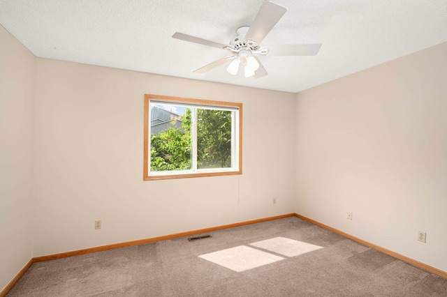 547 Woodduck Dr Unit G, Woodbury, MN 55125 - carpeted empty room with baseboards and ceiling fan