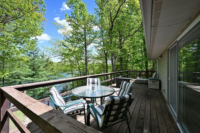 W2847 County Highway B, Madge Twp, WI 54870 - wooden terrace featuring outdoor dining space