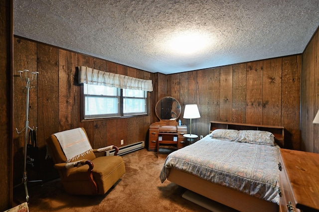 W2847 County Highway B, Madge Twp, WI 54870 - carpeted bedroom featuring wood walls, a textured ceiling, and a baseboard radiator