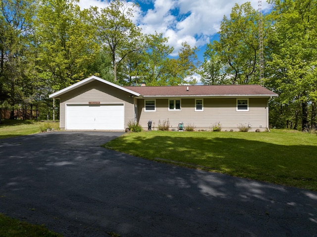 W2847 County Highway B, Madge Twp, WI 54870 - ranch-style home with an attached garage, asphalt driveway, and a front yard