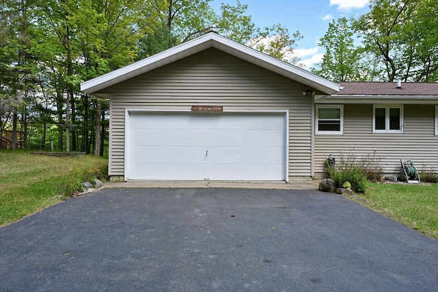 W2847 County Highway B, Madge Twp, WI 54870 - view of front of home with asphalt driveway