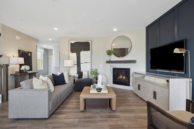 10383 Glacier Ln N, Maple Grove, MN 55369 - living room with a glass covered fireplace, wood finished floors, and recessed lighting